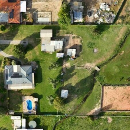High-resolution aerial image showing rural properties, paddocks, and power infrastructure captured during a aerial survey for mapping and land analysis in Perth Western Australia. 